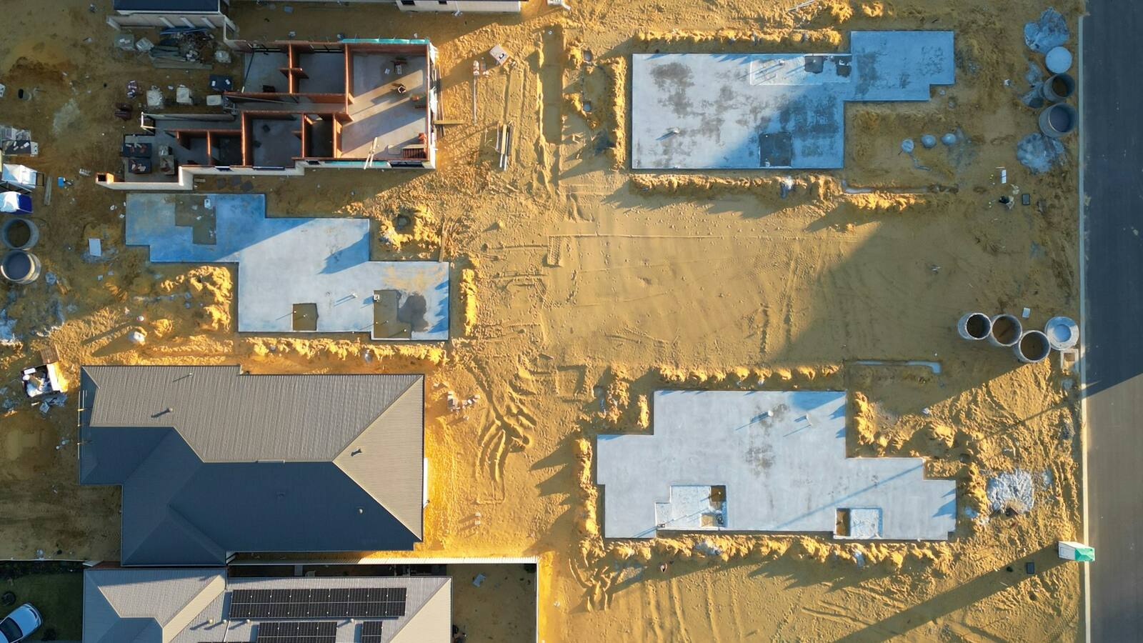 Aerial view of individual building plots staked out and under development